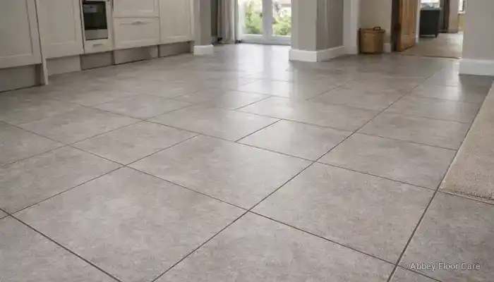 Ceramic and porcelain tiled floor in a lived-in UK home, showing realistic long-term appearance